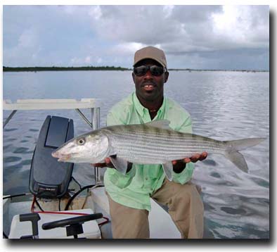 Grand Bahama Bonefishing guide Jeffrey Pinder with a big Bahamas bonefish